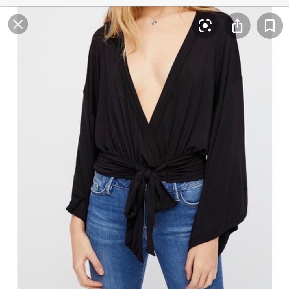 Free People. That’s a wrap shirt.